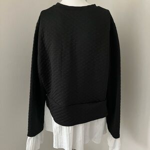 Elegant Black Quilted Sweatshirt with White Hem